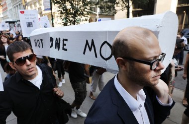 Over 100 drug reform advocates, former addicts, and family members who have lost loved ones to drugs participate in a New Orleans-style funeral march to demand action on Overdose Awareness Day on August 31st, 2017, in New York City. Thousands of Americans have died from overdoses as an opioid epidemic sweeps across the nation. The New York march, which included the Demolition Brass Band and demanded the immediate expansion of existing community overdose prevention services, concluded at the city morgue.