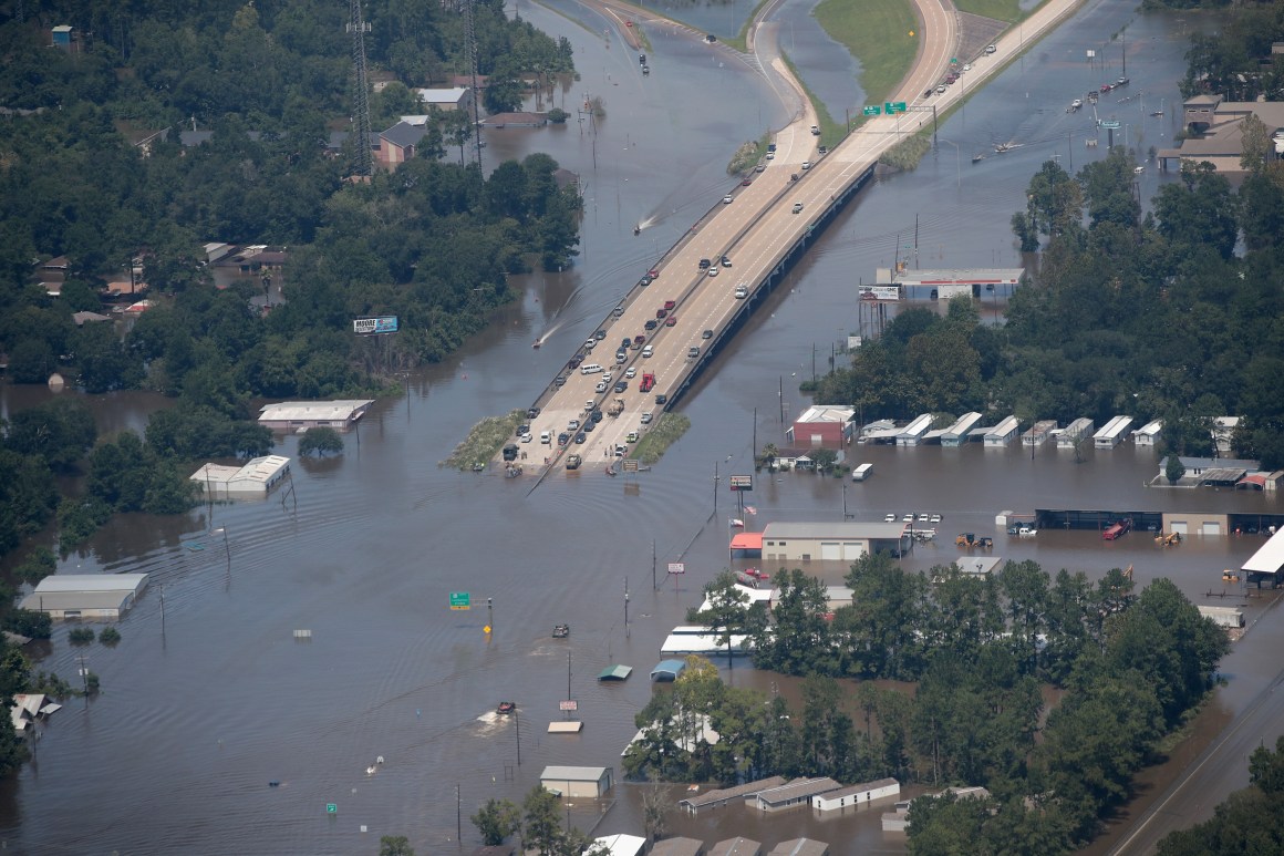 A road is covered by floodwater left in the wake of Hurricane and Tropical Storm Harvey on August 31st, 2017, near Houston, Texas.