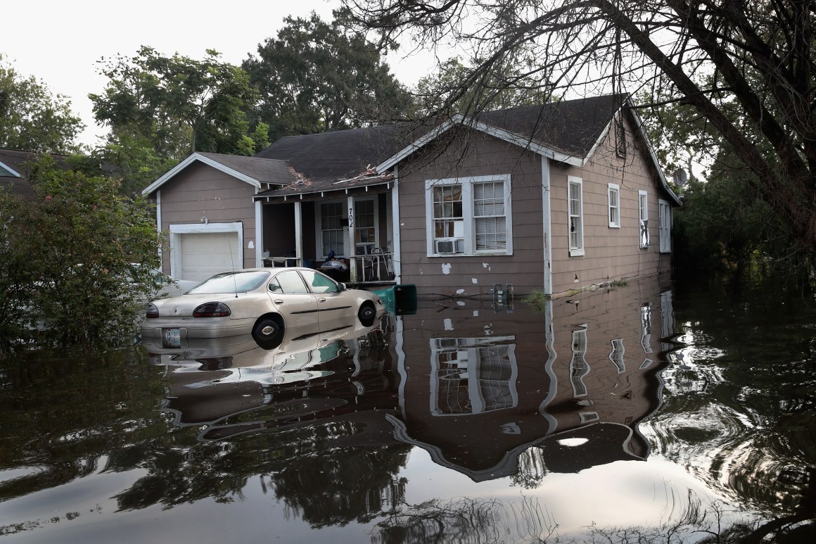 Floodwater surrounds a home after torrential rains pounded Southeast Texas following Hurricane and Tropical Storm Harvey, causing widespread flooding, on September 3th, 2017, in Orange, Texas.