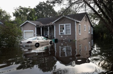 Floodwater surrounds a home after torrential rains pounded Southeast Texas following Hurricane and Tropical Storm Harvey, causing widespread flooding, on September 3th, 2017, in Orange, Texas.