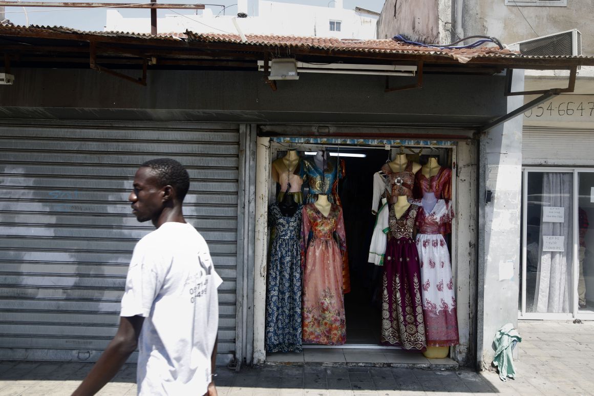 An African migrant walks in Neve Sha'anan, in South Tel Aviv, on September 4th, 2017.