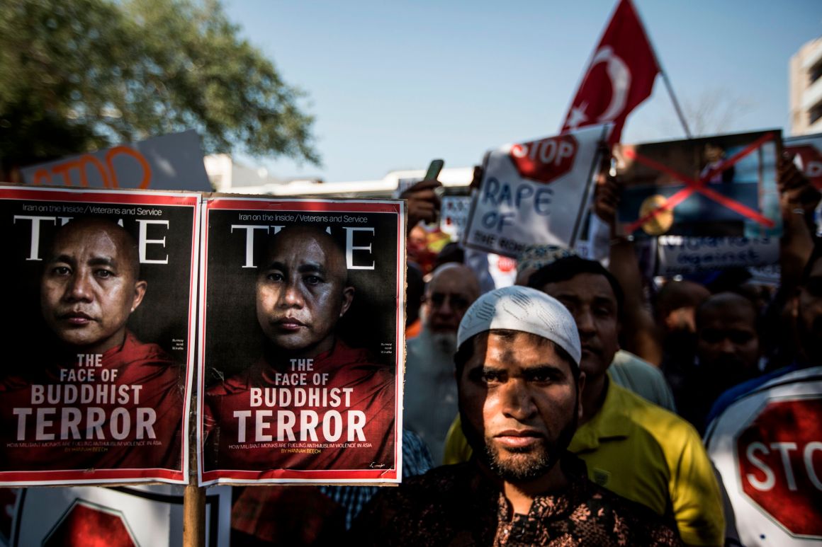 Protesters gather outside the Embassy of Myanmar in Pretoria on September 15th, 2017, during a demonstration against Naypyidaw's alleged "ethnic cleansing" of its Rohingya minority. The march by hundreds of demonstrators outside Myanmar's embassy turned violent on September 15th, an AFP journalist reported, and police outside the mission in Pretoria fired teargas and stun grenades to disperse the angry crowd.