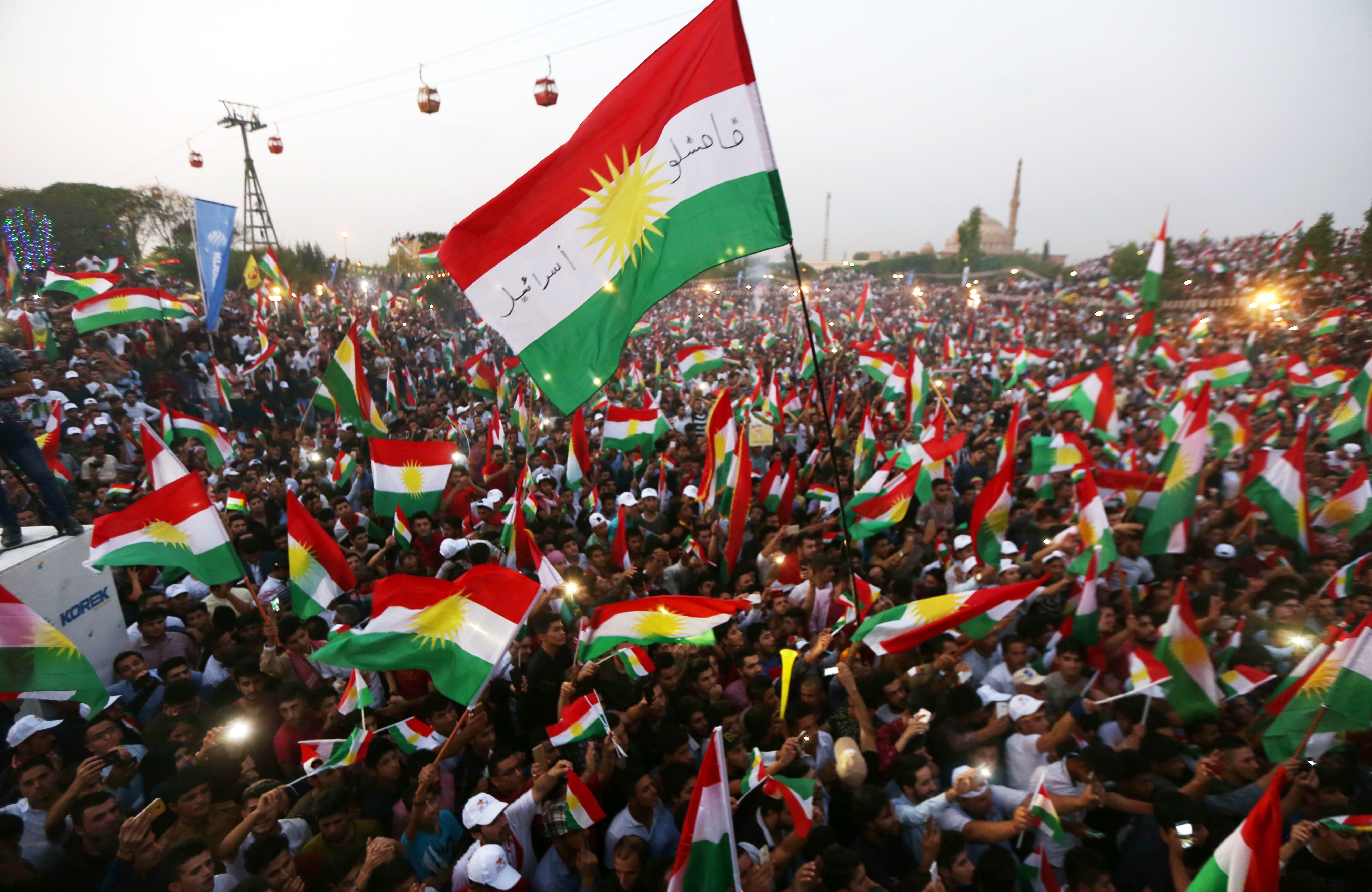 Iraqi Kurds fly Kurdish flags during an event to urge people to vote in an upcoming independence referendum in Arbil, the capital of the autonomous Kurdish region of northern Iraq, on September 16th, 2017.