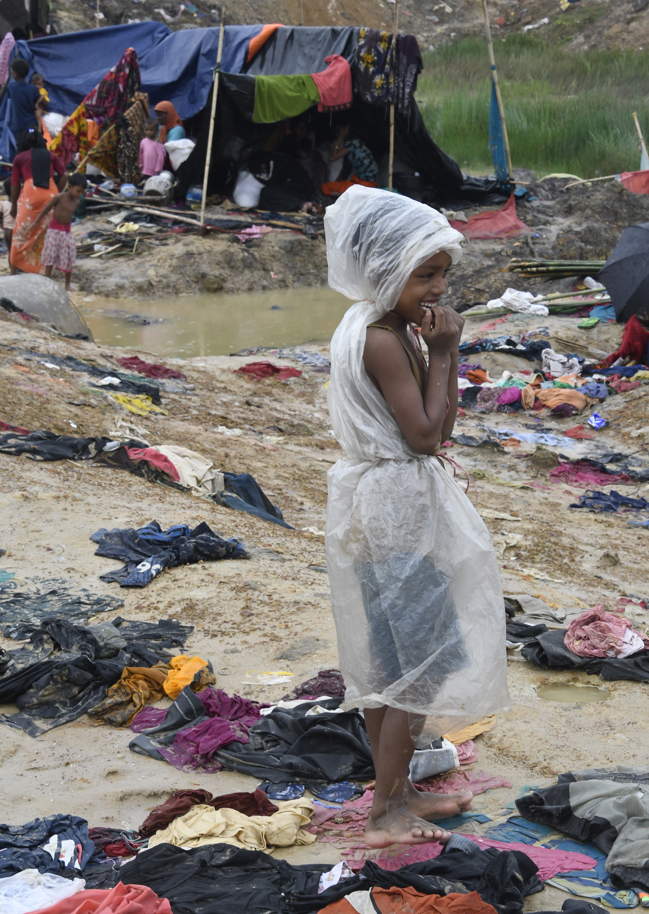 A Rohingya Muslim refugee near the Bangladesh town of Gumdhum on September 17th, 2017. Heavy monsoon rain heaped new misery on hundreds of thousands of Muslim Rohinyga stuck in makeshift camps in Bangladesh after fleeing violence in Myanmar, as authorities started a drive to force them to a new site.