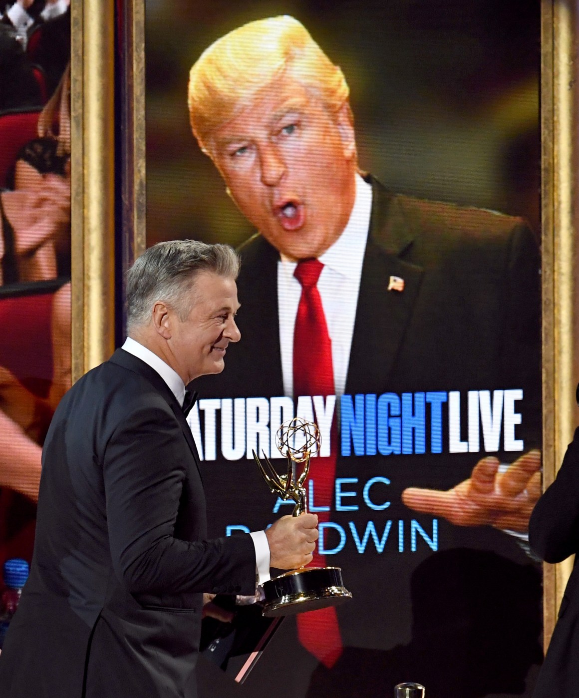 Actor Alec Baldwin accepts an award on September 17th, 2017, for Outstanding Supporting Actor in a Comedy Series for his portrayal of Donald Trump on Saturday Night Live, in Los Angeles, California.