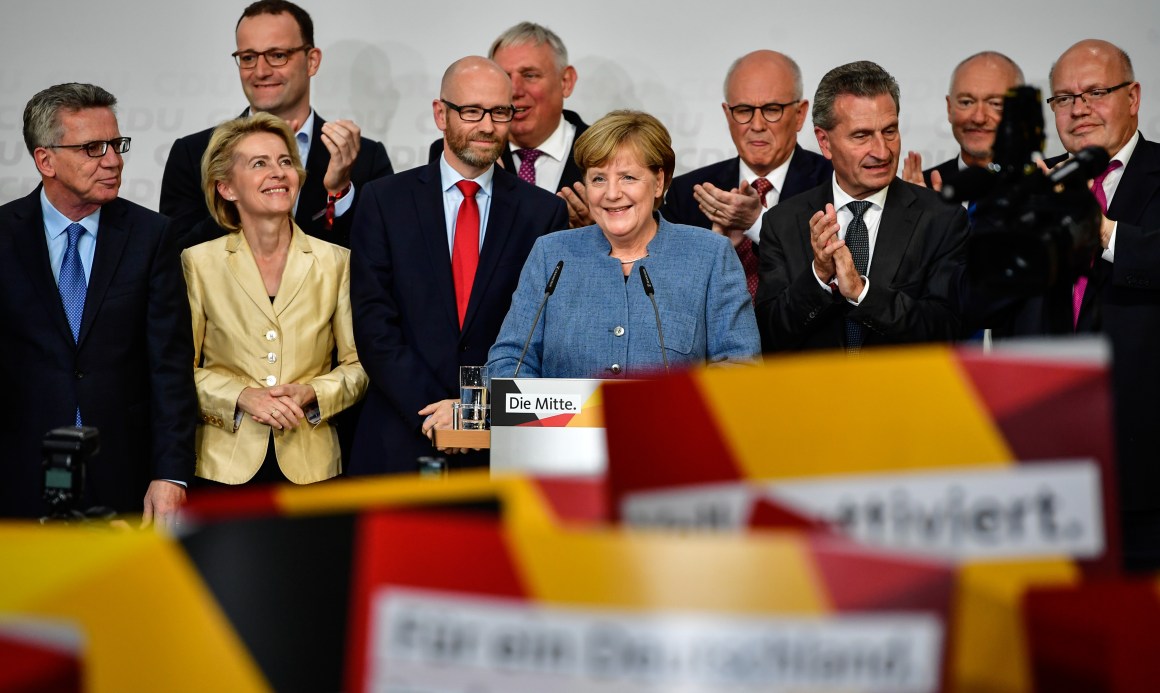 German Chancellor and Christian Democrat (CDU) Angela Merkel (C) reacts to initial results that gave the party 32.9 percent of the vote, giving it a first place finish, in German federal elections on September 24th, 2017, in Berlin, Germany.