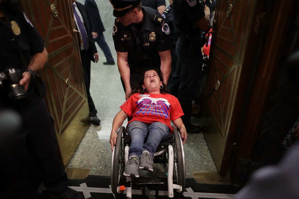 U.S. Capitol Police arrest disability rights protesters at a Senate Finance Committee hearing about the proposed Graham-Cassidy Health Care Bill in Washington, D.C., on September 25th, 2017.