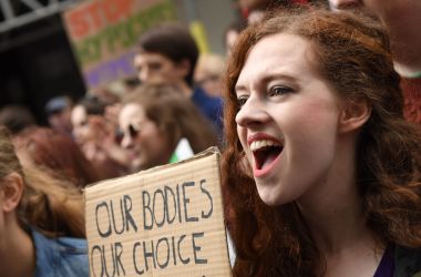 Protesters hold up placards during the London March for Choice, calling for the legalising of abortion in Ireland after the referendum announcement, outside the Embassy of Ireland in central London on September 30, 2017. Tens of thousands are expected at a rally for abortion rights in Dublin on September 30, campaigning on one side of a fierce debate after Ireland announced it will hold a referendum on the issue next year.