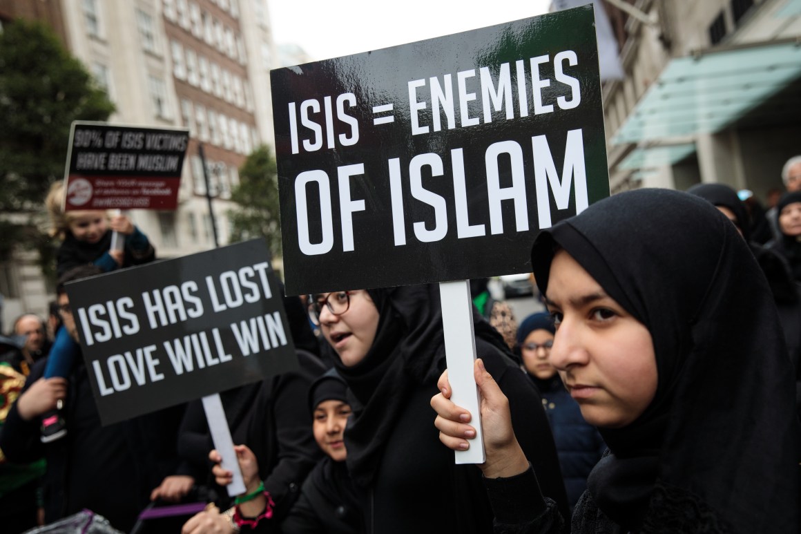 Protesters hold placards during the annual Ashura march in Marble Arch on October 1st, 2017, in London, England. Hundreds of protesters marched through London to mark Ashura and celebrate the defeat of the Islamic State in Iraq and Syria. Ashura is a Muslim festival of remembrance that falls on the 10th day of Muharram in the Islamic calendar.