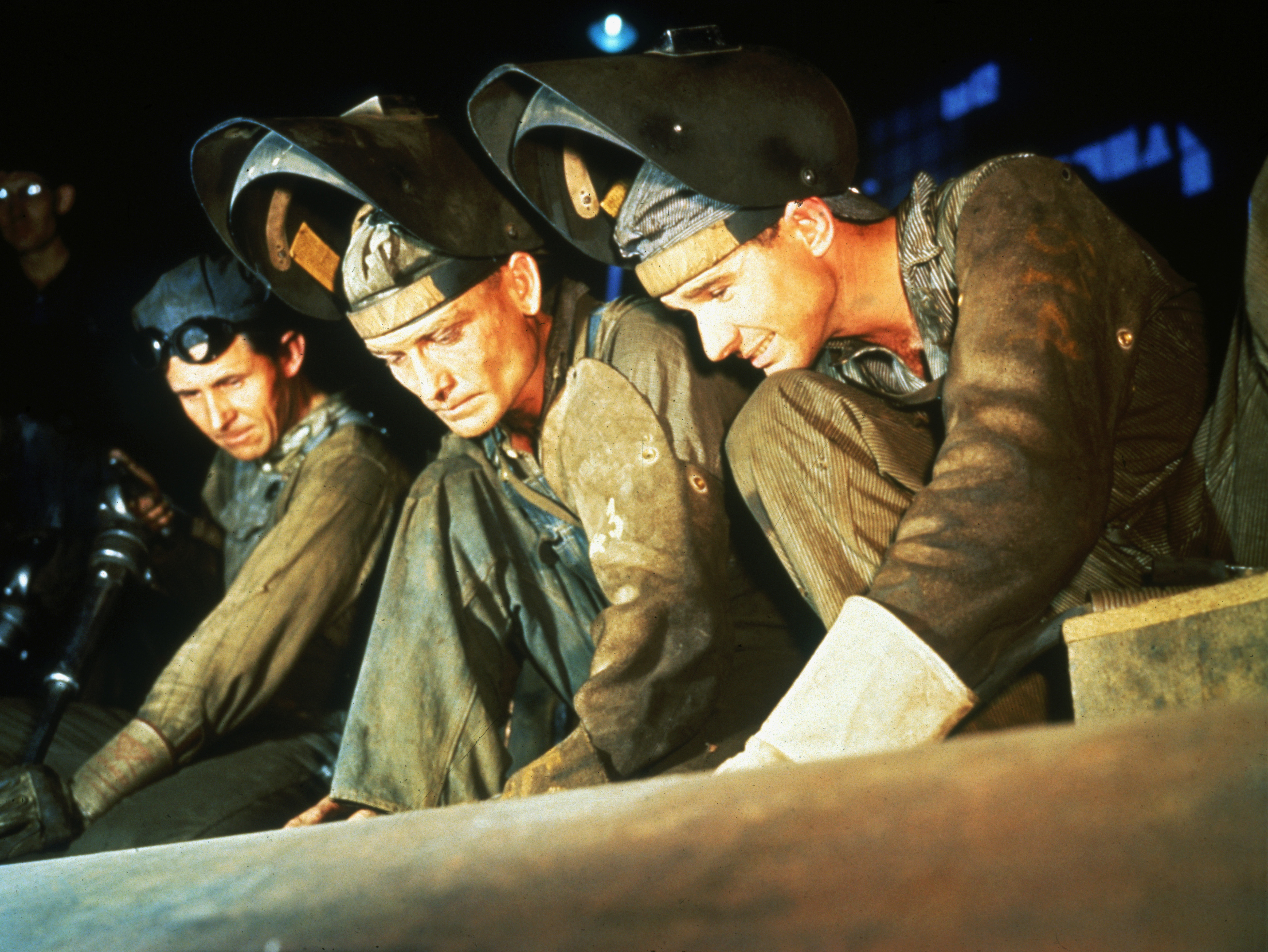 Two welders and a riveter make ship boilers at the Combustion Engineering Company in Chattanooga, Tennessee, in June of 1942.