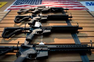 Assault rifles hang on the wall for sale at Blue Ridge Arsenal in Chantilly, Virginia, on October 6th, 2017.