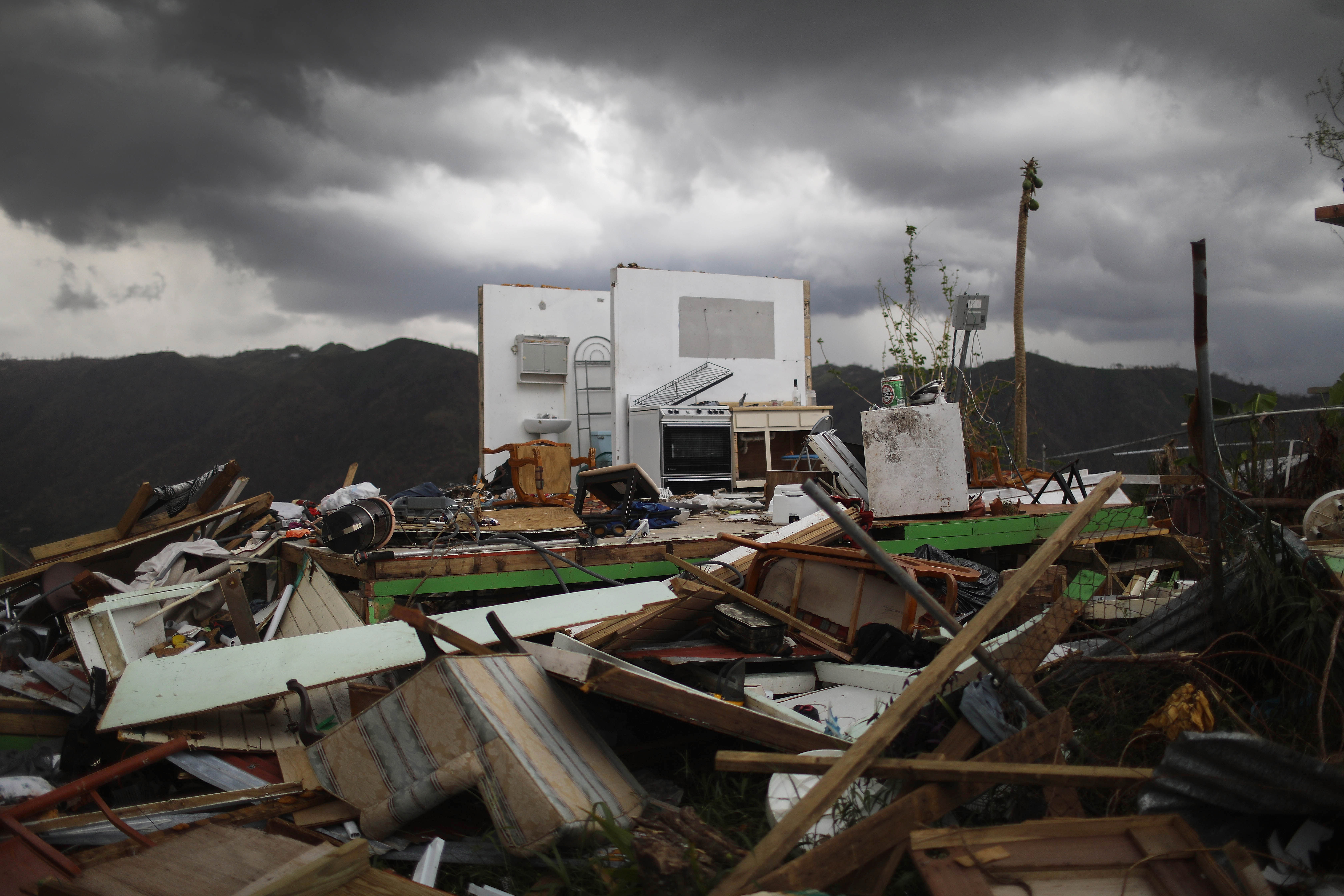 The remnants of a destroyed home stand more than two weeks after Hurricane Maria hit the island on October 6th, 2017, in Morovis, Puerto Rico.