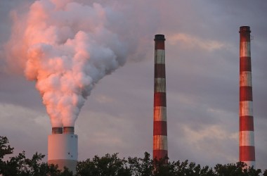 Emissions spew out of a large stack at the coal-fired Morgantown Generating Station in Newburg, Maryland.