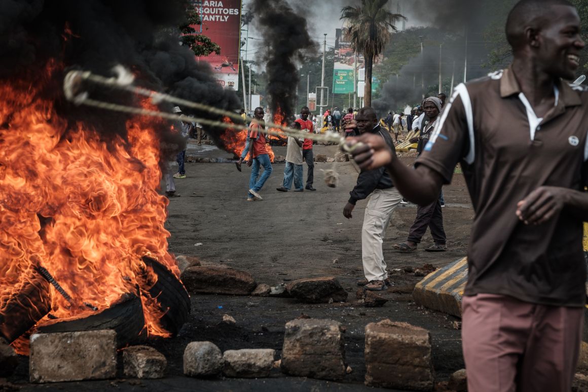 Opposition supporters block streets during a protest in Kisumu, Kenya, on October 11th, 2017. Supporters of Kenya's opposition leader Raila Odinga took to the streets after his withdrawal from a presidential election plunged the country into uncharted waters.