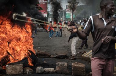 Opposition supporters block streets during a protest in Kisumu, Kenya, on October 11th, 2017. Supporters of Kenya's opposition leader Raila Odinga took to the streets after his withdrawal from a presidential election plunged the country into uncharted waters.