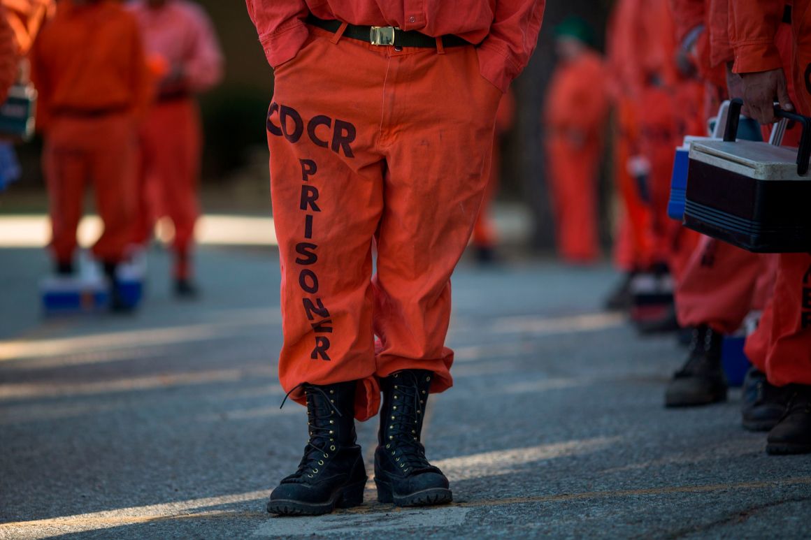 Prisoners at Oak Glen Conservation Camp line up for work deployment under the authority of the California Department of Forestry and Fire Protection on September 28th, 2017, near Yucaipa, California.