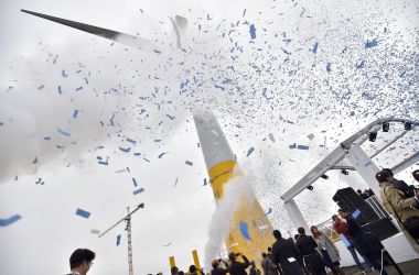 Onlookers inaugurate the first French offshore wind turbine on October 13th, 2017, in the port of Saint-Nazaire, France.