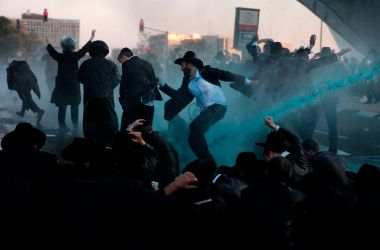 Israeli security forces break up a protest of ultra-Orthodox Jews with water cannons in Jerusalem on October 23rd, 2017. Several thousand ultra-Orthodox Jews blocked the main entrance to Jerusalem as part of a series of demonstrations against serving in the Israeli military.