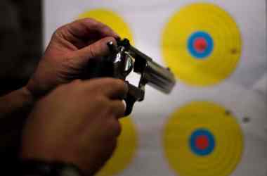 A man adjusts the sights on his .357 revolver at the Lynchburg Arms & Indoor Shooting Range in Lynchburg, Virginia, on October 20th, 2017.