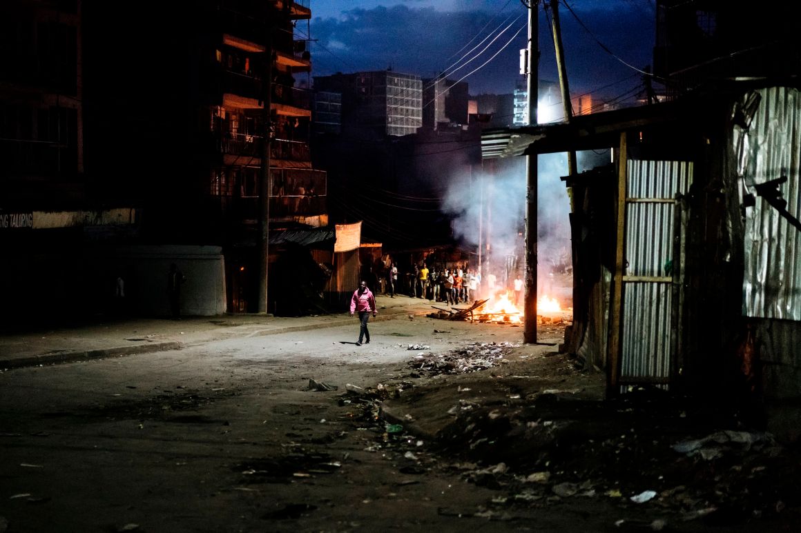 Protesters gather around a burning barricade in the Mathare slums in Nairobi, Kenya, on October 30th, 2017, during demonstrations following the announcements of the presidential election results.