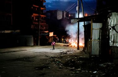 Protesters gather around a burning barricade in the Mathare slums in Nairobi, Kenya, on October 30th, 2017, during demonstrations following the announcements of the presidential election results.