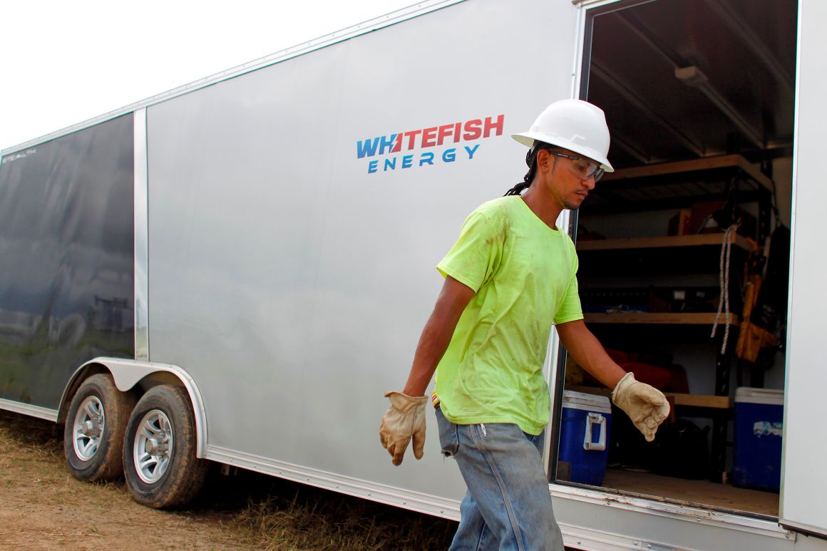 A worker from Whitefish Energy Holdings works to restore the island's power grid, damaged during Hurricane Maria in Manati, Puerto Rico, on October 31st, 2017.