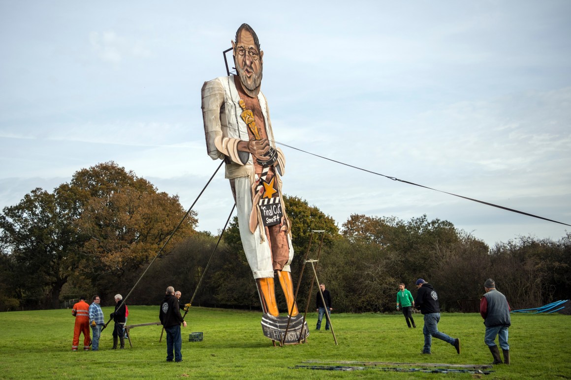 Members of the Edenbridge Bonfire Society unveil an effigy of film producer Harvey Weinstein on November 1st, 2017, in Edenbridge, England. The Edenbridge Bonfire Society has created a large-scale effigy of a public figure for their annual bonfire for the last 17 years, with previous names including Lance Armstrong, Saddam Hussein, and President Donald Trump.