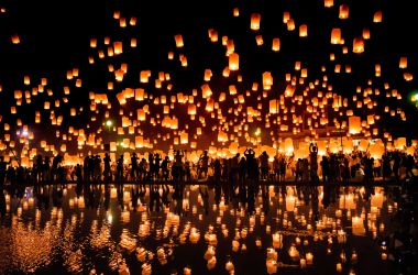 A crowd releases lanterns into the air to celebrate the Yee Peng festival, also known as the Festival of Lights, in the city of Chiang Mai in Northern Thailand on November 3rd, 2017.