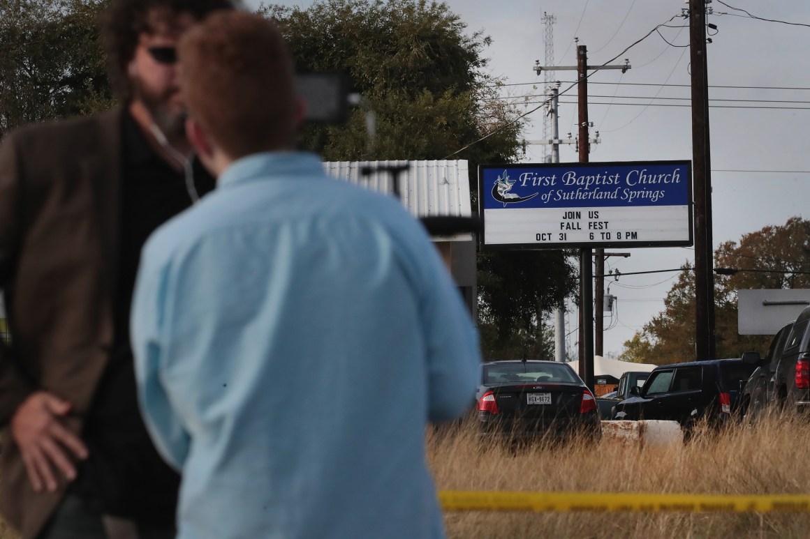 Emergency vehicles are parked outside the first Baptist Church on November 6th, 2017, in Sutherland Springs, Texas.