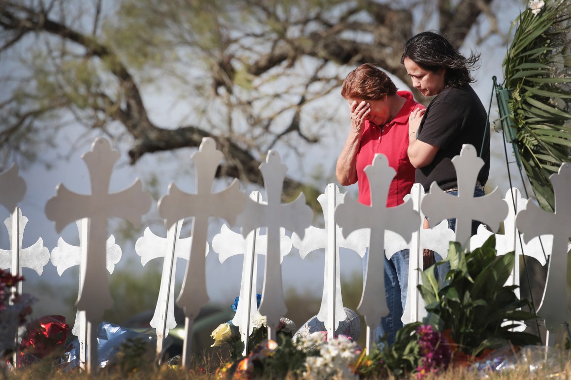 Maria Durand and her daughter, Lupita Alcoces, visit a memorial on the edge of town honoring the 26 worshippers killed at the First Baptist Church on November 7th, 2017, in Sutherland Springs, Texas. Durand, who teaches bible study at the church, lost several friends in the shooting.