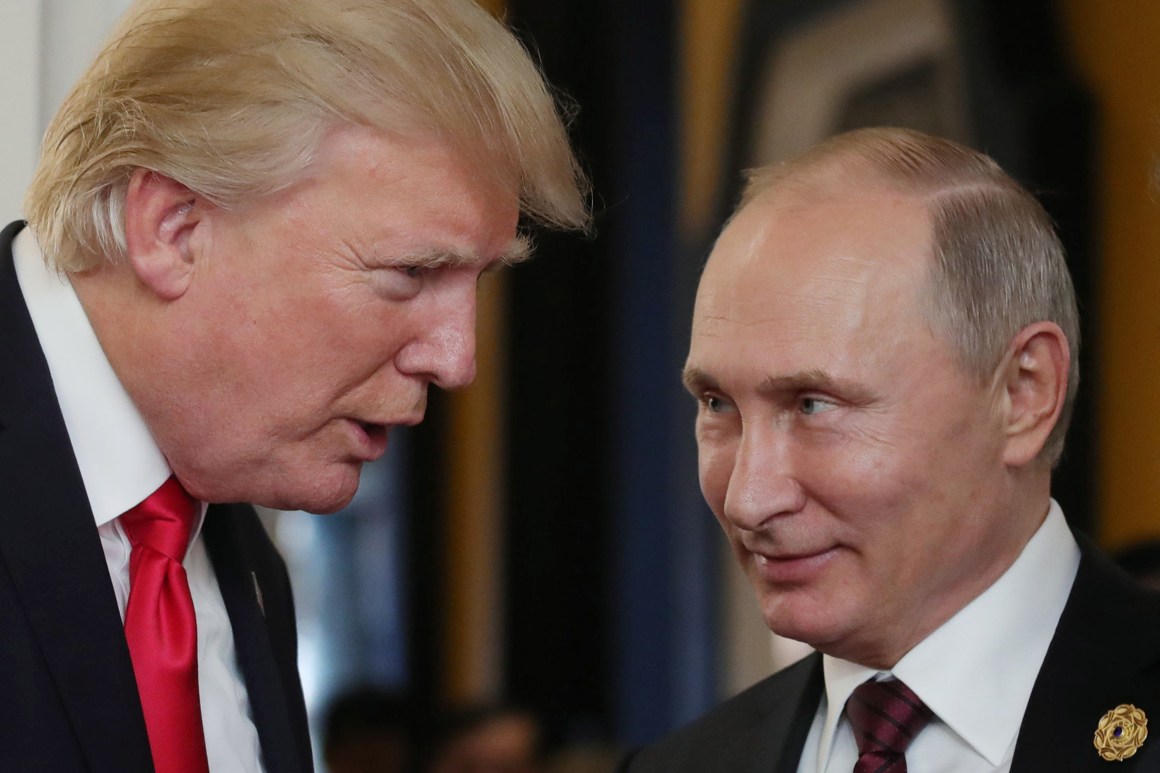 President Donald Trump chats with Russia's President Vladimir Putin as they attend the APEC Economic Leaders' Meeting, part of the Asia-Pacific Economic Cooperation leaders' summit in the central Vietnamese city of Danang on November 11th, 2017.