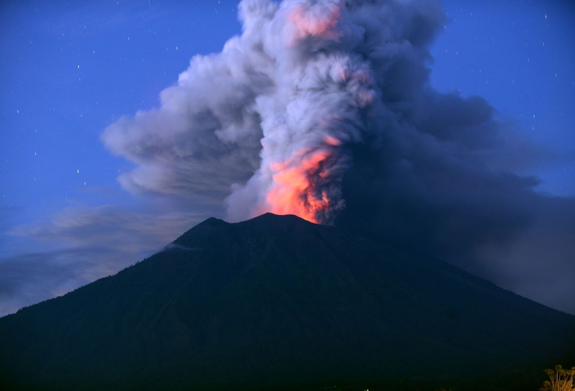 A general view shows Mount Agung erupting seen at night from the Kubu sub-district in Karangasem Regency on Indonesia's resort island of Bali on November 28th, 2017.