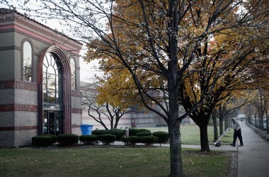 A worker pushes a cart outside of the Cloverhill Bakery facility on November 29th, 2017, in Chicago, Illinois.