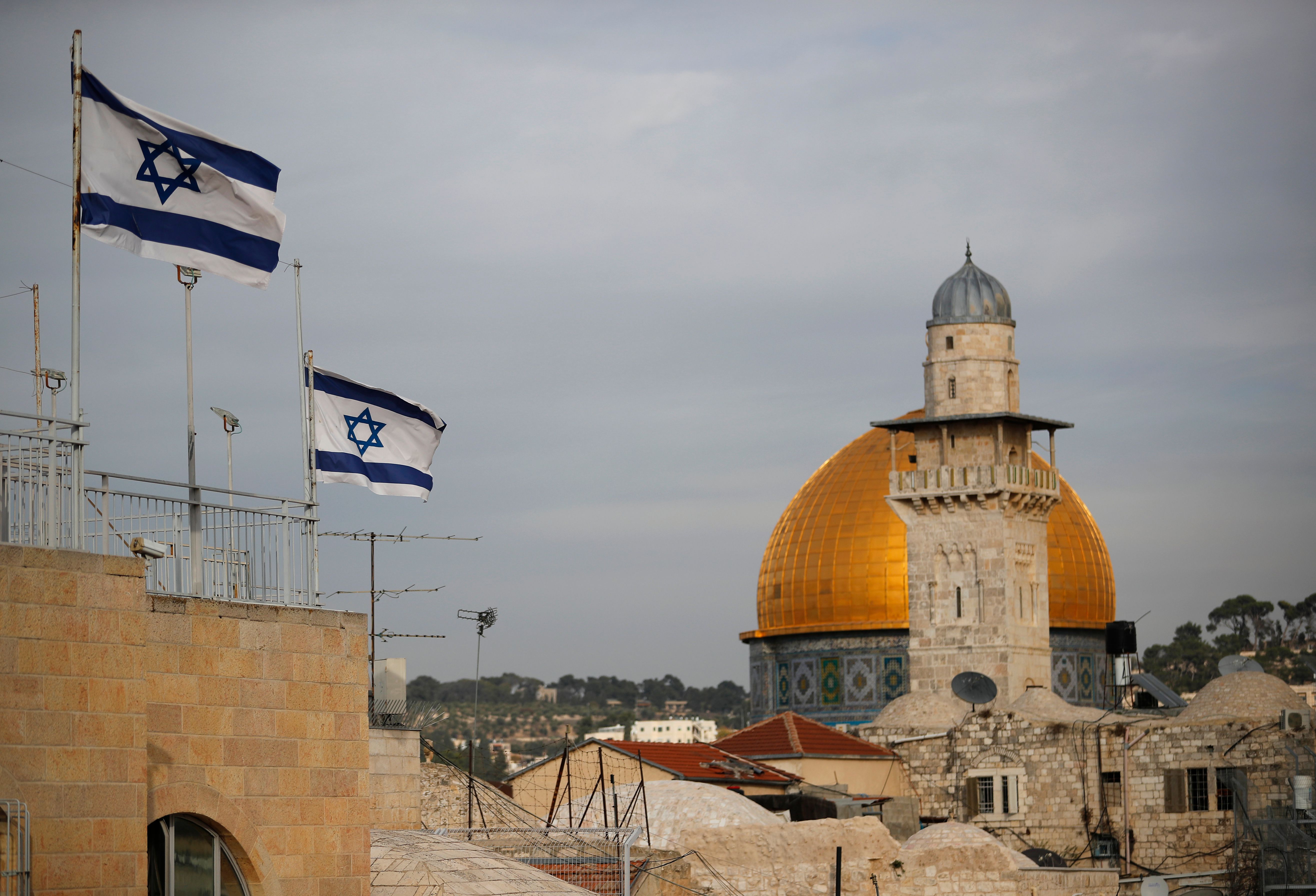 Israeli flags fly near the Dome of the Rock in the al-Aqsa mosque compound on December 5th, 2017.