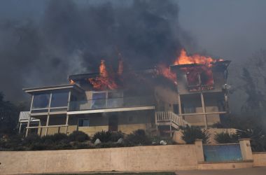 A house burns to the ground during the Thomas wildfire in Ventura, California.