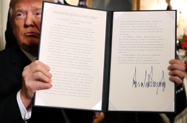 President Donald Trump holds up a proclamation signed December 6th, 2017, saying the U.S. government will formally recognize Jerusalem as the capital of Israel.