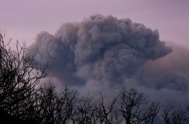 A plume of smoke is seen from Ojai, California, as the Thomas Fire grows and advances toward seaside communities on December 10th, 2017, near Carpinteria, California.