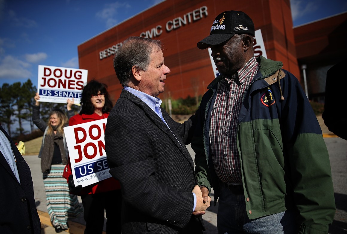 Democratic Senatorial candidate Doug Jones greets voters outside of a polling station at the Bessemer Civic Center on December 12th, 2017, in Bessemer, Alabama.