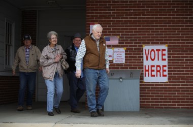 Voters exit after casting their ballots at a polling station setup in the Fire Department on December 11th, 2017, in Gallant, Alabama. Alabama voters are casting their ballot for either Republican Roy Moore or his Democratic challenger Doug Jones in a special election to decide who will replace Attorney General Jeff Sessions in the U.S. Senate.