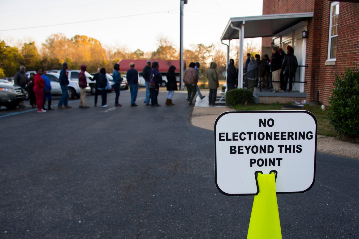 Voters stand in a long line that leads out the door to vote at Beulah Baptist Church polling station in Montgomery, Alabama, on December 12th, 2017.