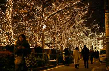 People admire Christmas illuminations along the Meguro River in Tokyo, Japan, on December 17th, 2017. The illuminations, which encompass some 500,000 LED lights, will be displayed until December 24th.