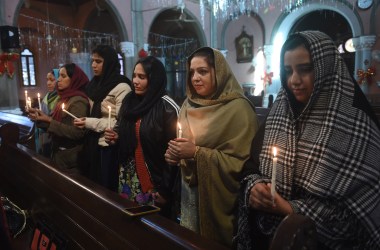 Pakistani Christians take part in a service on December 18th, 2017, for the victims of a suicide attack on a church at the Sacred Heart Cathedral in Lahore.