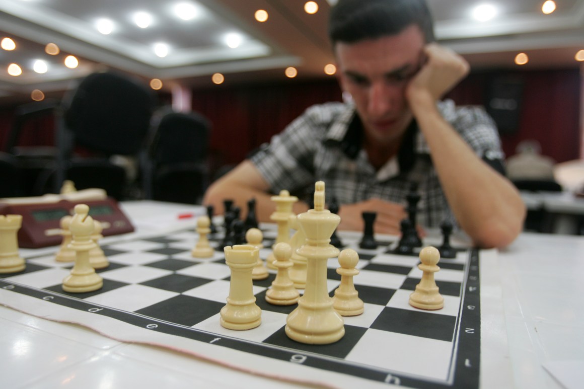 A man plays chess in Baghdad, Iraq.