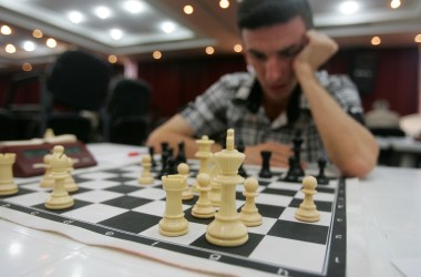 A man plays chess in Baghdad, Iraq.