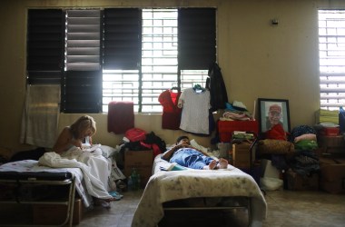 Two women rest in a shelter for Hurricane Maria victims in in Toa Baja, Puerto Rico, on December 25th, 2017.