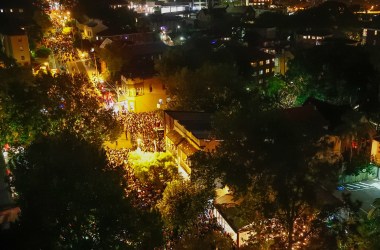 Crowds of people pack the streets as they leave McMahons Point after viewing the midnight fireworks display on New Year's Eve in Sydney, Australia. Sydney New Year's Eve is an annual multi-tiered program held every year that is regularly viewed by more than one million people surrounding the harbor and one billion people worldwide through televised events.