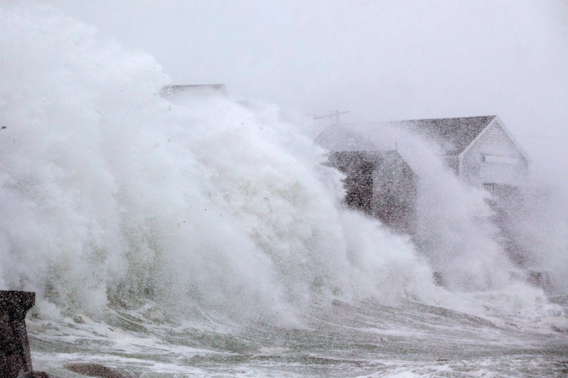 A wave crashes over a home on Lighthouse Road as a massive winter storm begins to bear down on the region on January 4th, 2018, in Scituate, Massachusetts. The "bomb cyclone" was expected to dump heavy snows in New England as the storm system moved up the U.S. east coast.