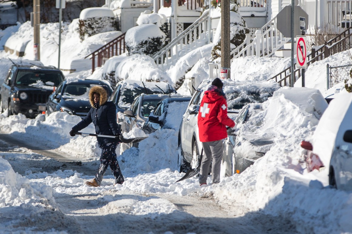 Residents shovel out vehicles the day after a snowstorm, on January 5th, 2018, in Boston, Massachusetts.