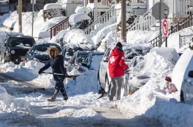 Residents shovel out vehicles the day after a snowstorm, on January 5th, 2018, in Boston, Massachusetts.