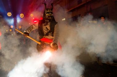 A costumed reveler takes part in the Correfoc festival in Palma de Mallorca, Spain, on January 21st, 2018. During Correfoc, participants dress as demons and devils and move through the streets scaring people with fire and fireworks.